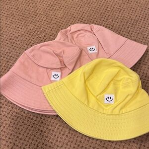 Pink and Yellow Bucket Hats with Smiley Patch